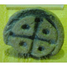 Old stamp seal with a cross and four dots